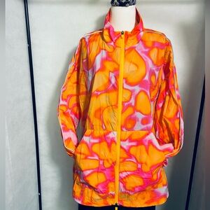 Yellow, orange and pink windbreaker with reflective piping